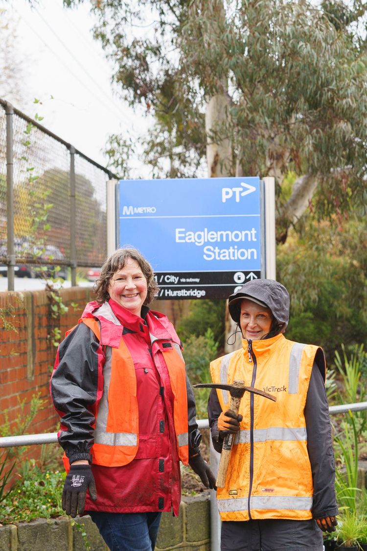 Volunteers Having Fun In The Rain